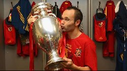 How many trophies does Iniesta have?